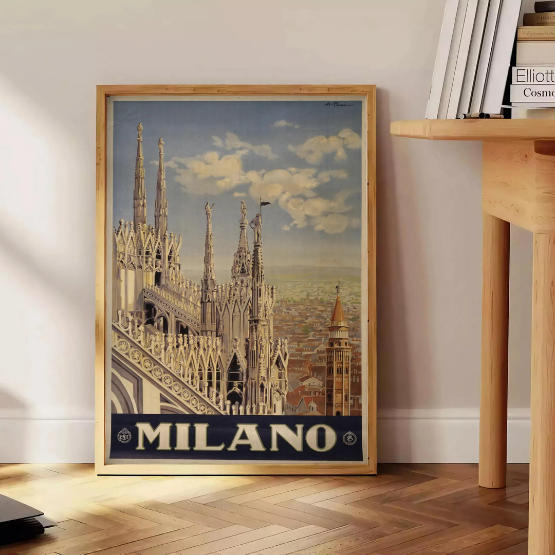 Stylized illustration of Milan's skyline with bold black and green colors - beside a round wooden side table with books