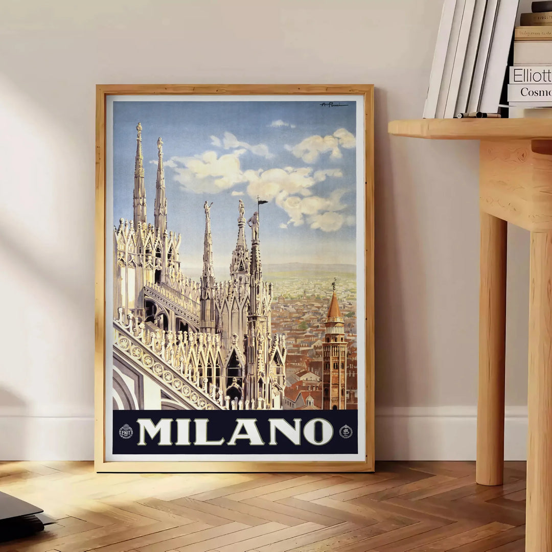 Stylized illustration of Milan's skyline in black and green - beside a round wooden side table with books