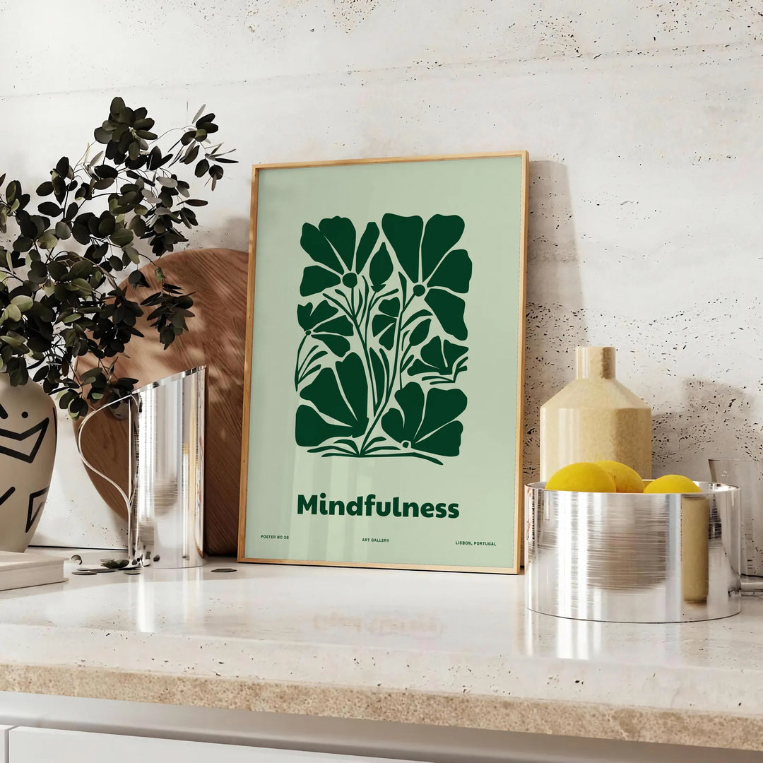 A serene yoga silhouette in green and gray tones against a textured background - styled on a counter with eucalyptus and a bowl of lemons