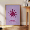 A serene yoga scene with calming blue and purple tones - beside a round wooden side table with books