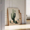Minimalist cactus illustration in black and gray tones - leaning on a herringbone floor against a white panelled wall
