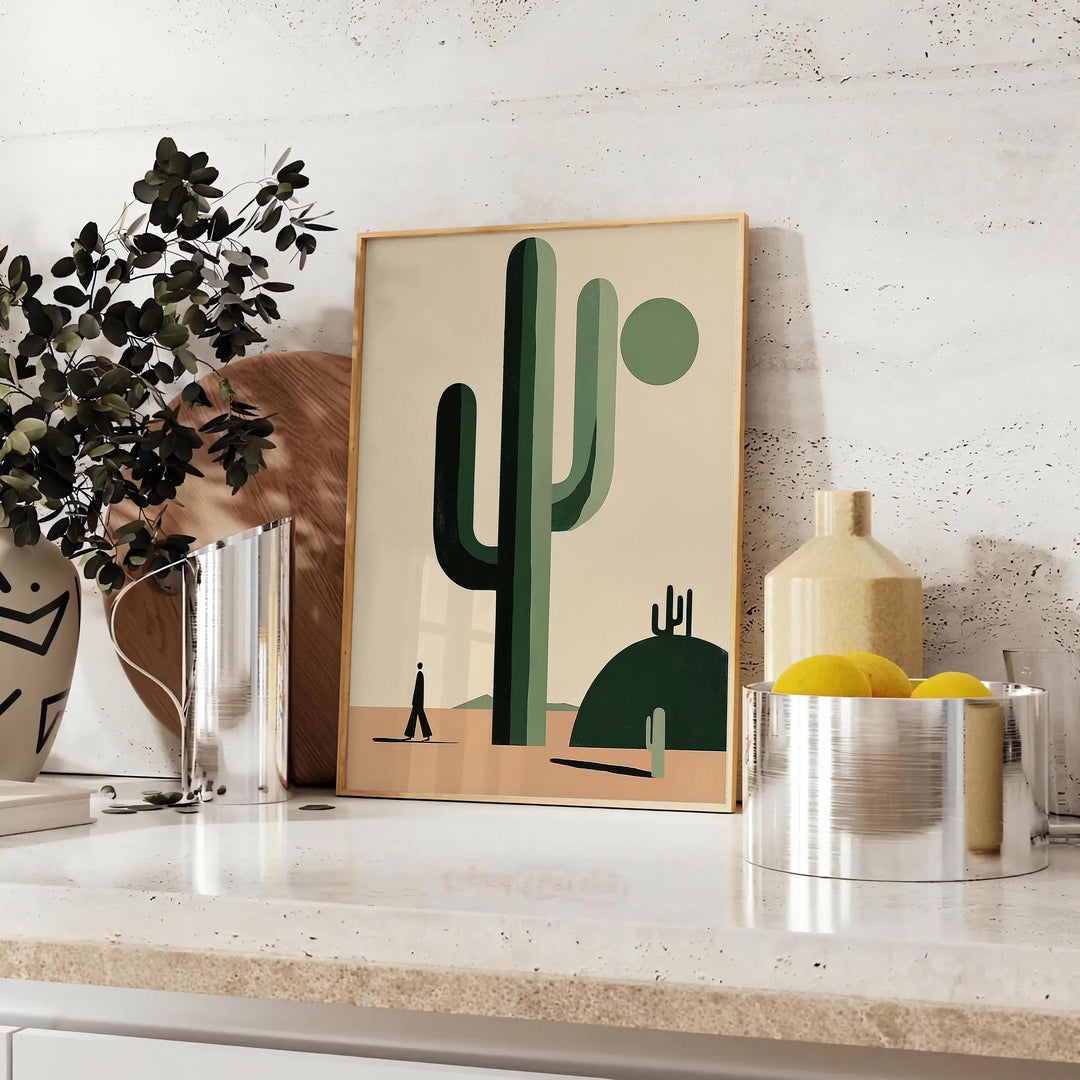 A minimalist cactus illustration in black and gray tones - styled on a counter with eucalyptus and a bowl of lemons