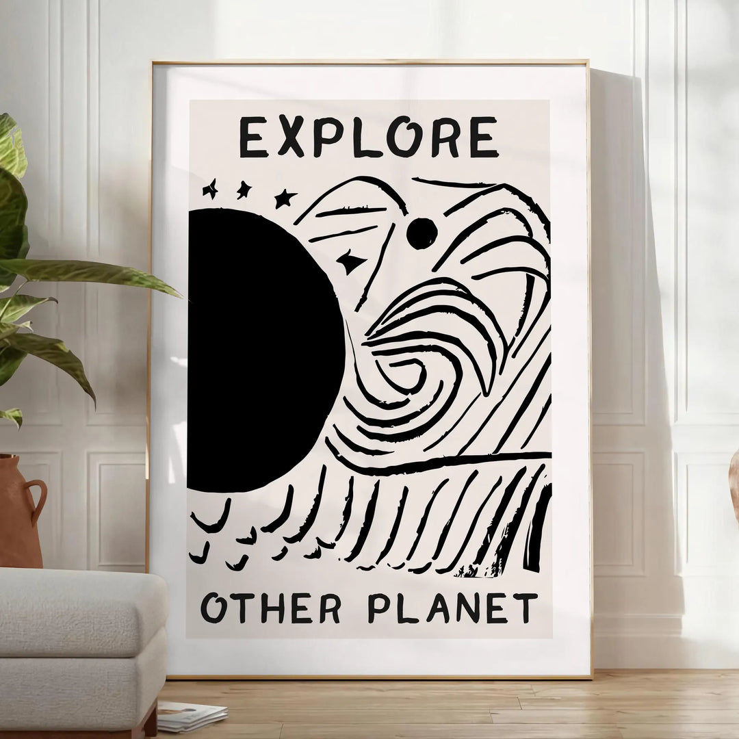 abstract black and white design depicting an imaginative cosmic landscape - in a bright minimalist room with a plant and an armchair