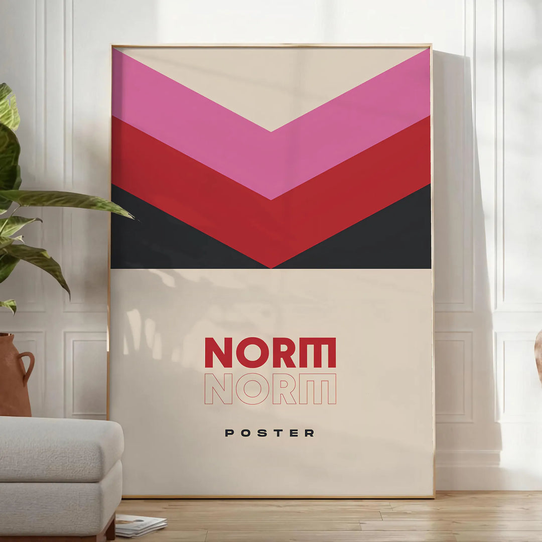 Abstract modern art with black and brown tones, featuring geometric shapes - in a bright minimalist room with a plant and an armchair