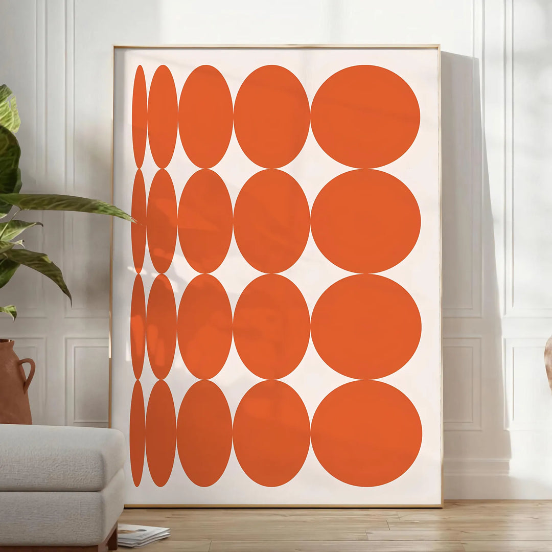 Abstract composition with orange and earthy brown tones in a modern style - in a bright minimalist room with a plant and an armchair