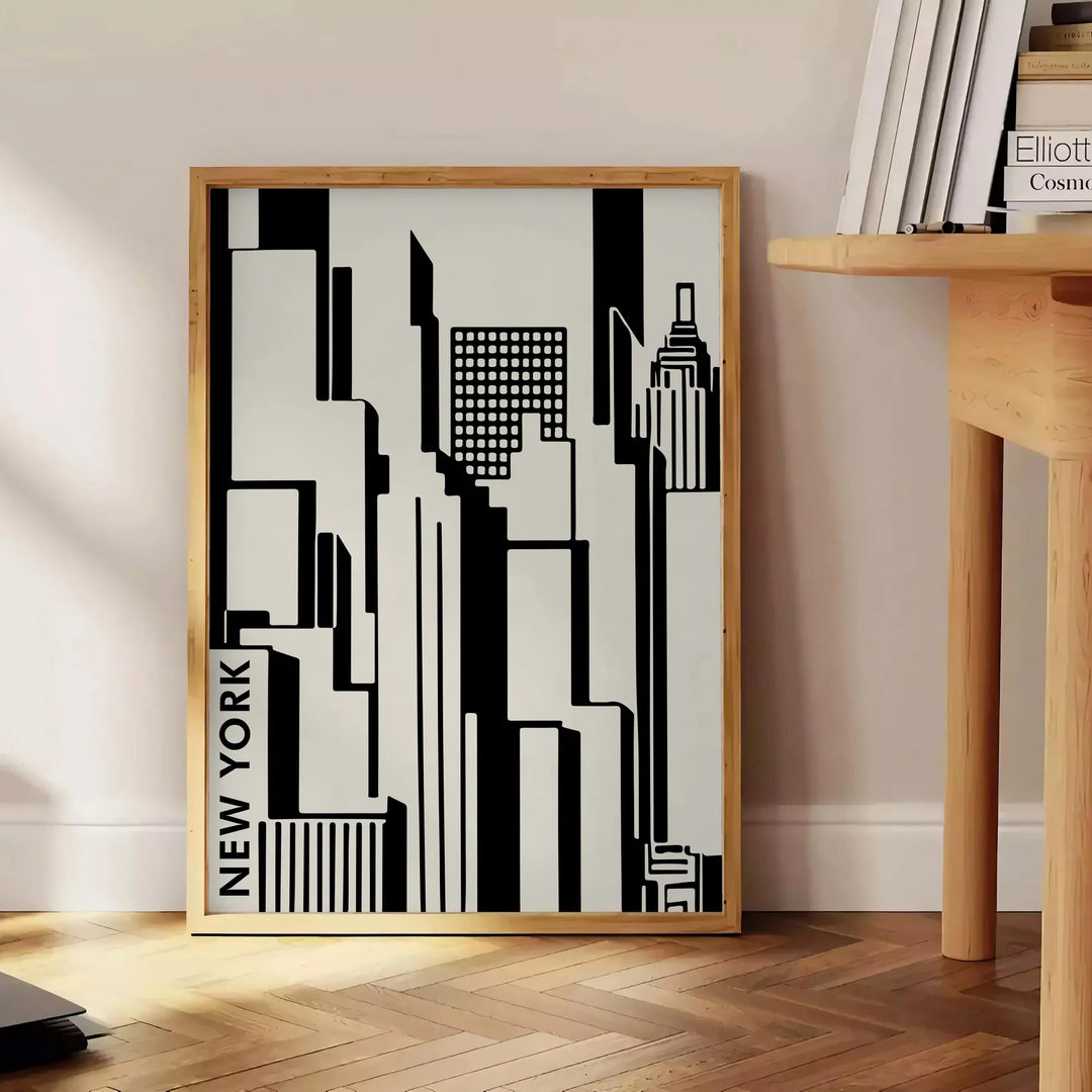 Abstract composition with black and orange shapes in a modern style - beside a round wooden side table with books