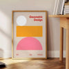 Abstract modern art with gray and orange hues depicting a cosmic theme - beside a round wooden side table with books