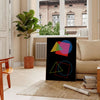 Abstract shapes in orange and black, modern art style - in a Parisian living room with a sofa and a fig plant