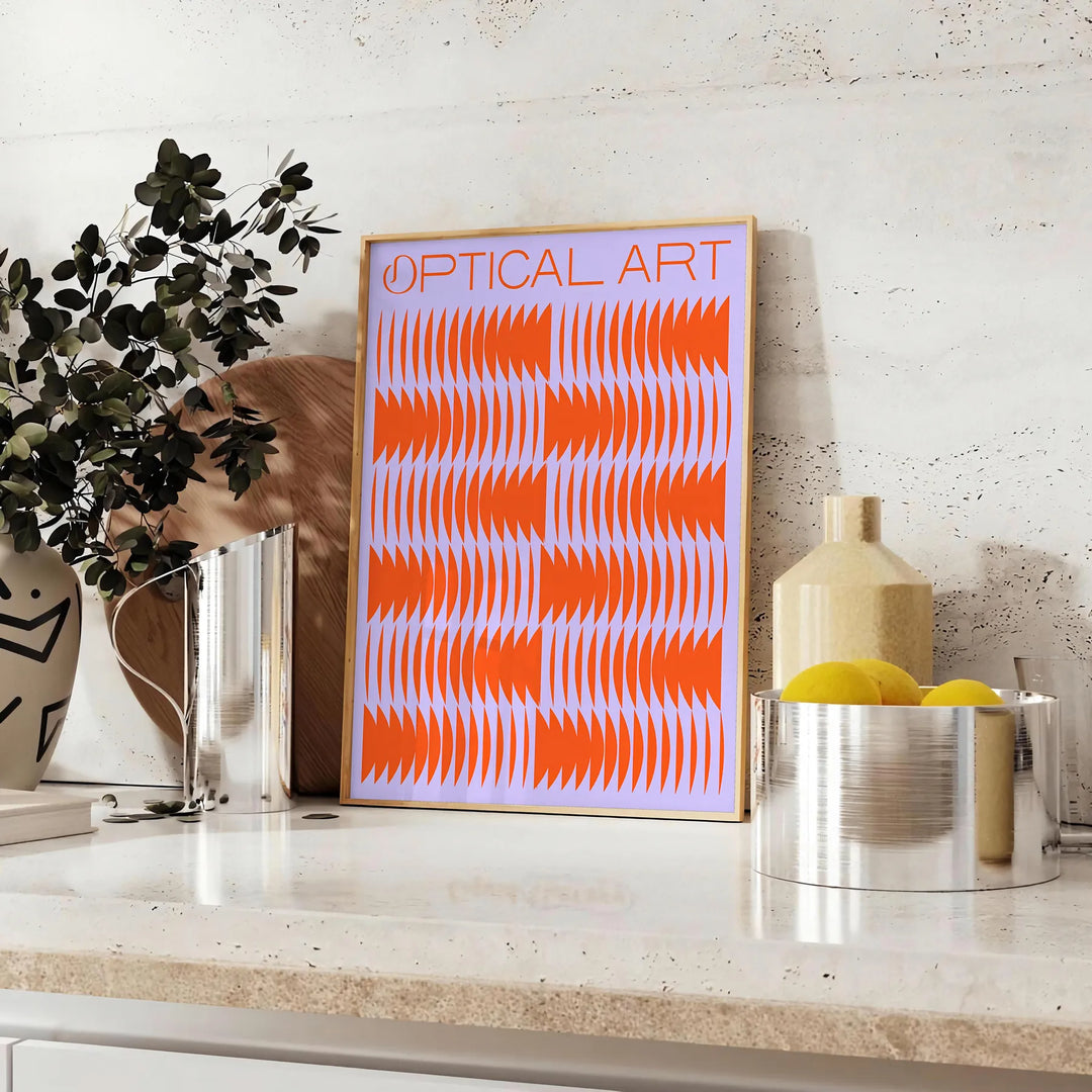 Abstract composition with orange and blue shapes in a modern style - styled on a counter with eucalyptus and a bowl of lemons