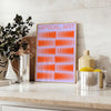 Abstract composition with orange and blue shapes in a modern style - styled on a counter with eucalyptus and a bowl of lemons