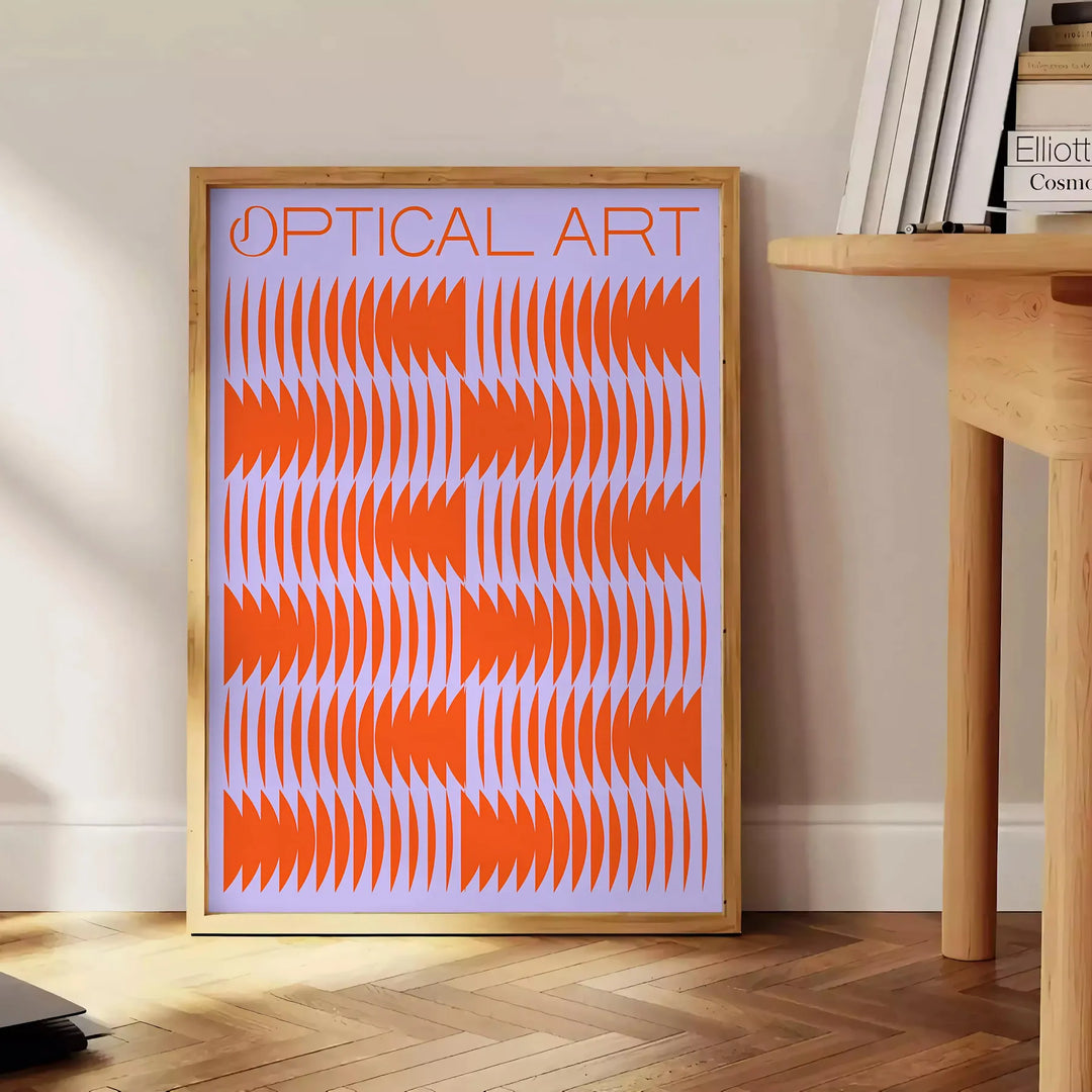Abstract composition with orange and blue shapes in a modern style - beside a round wooden side table with books