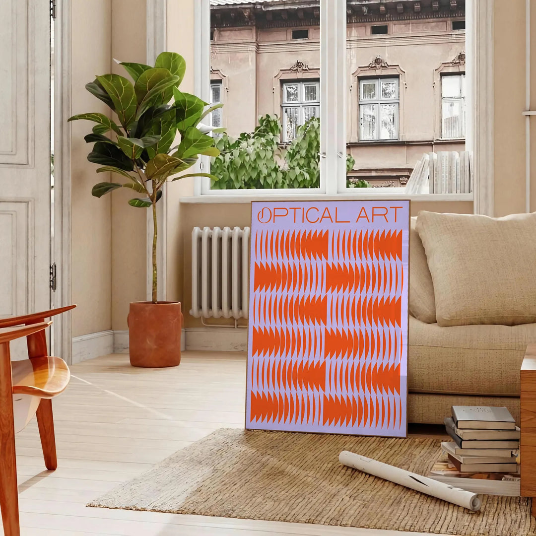 Abstract composition with orange and blue shapes in a modern style - in a Parisian living room with a sofa and a fig plant