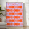 Abstract composition with orange and blue shapes in a modern style - in a bright minimalist room with a plant and an armchair