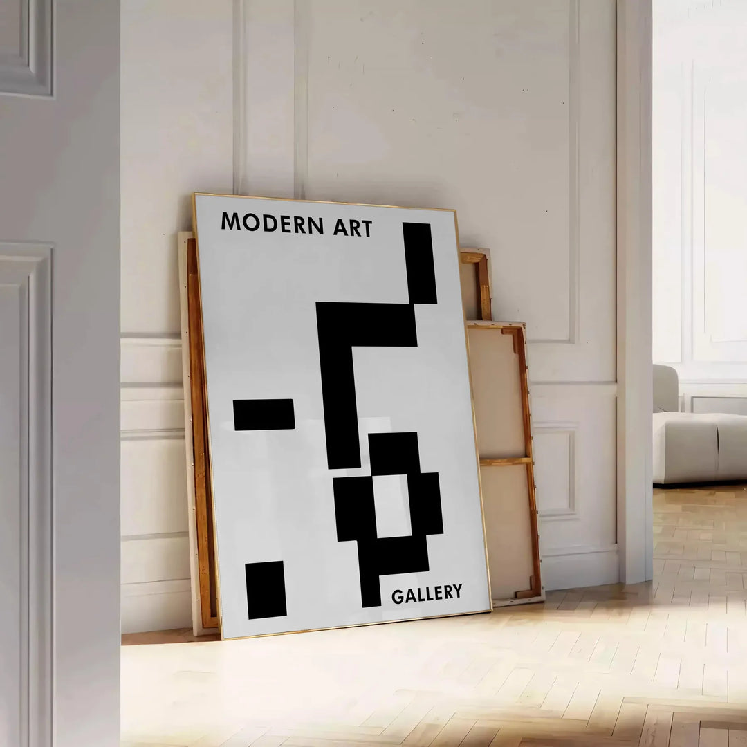 Abstract composition with black and blue shapes and lines - leaning on a herringbone floor against a white panelled wall