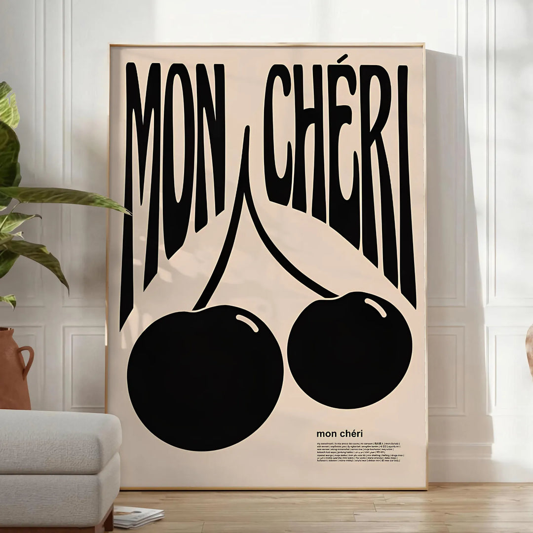 Abstract design featuring cherries in black and orange hues - in a bright minimalist room with a plant and an armchair