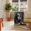 A playful monkey wearing glasses and a hoodie, surrounded by digital elements in green and gray. - in a Parisian living room with a sofa and a fig plant