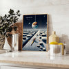 Surreal illustration of a moonlit rowing scene in blue-gray tones - styled on a counter with eucalyptus and a bowl of lemons