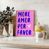Abstract design featuring the phrase 'Más Amor Por Favor' in blue and purple tones - styled on a counter with eucalyptus and a bowl of lemons