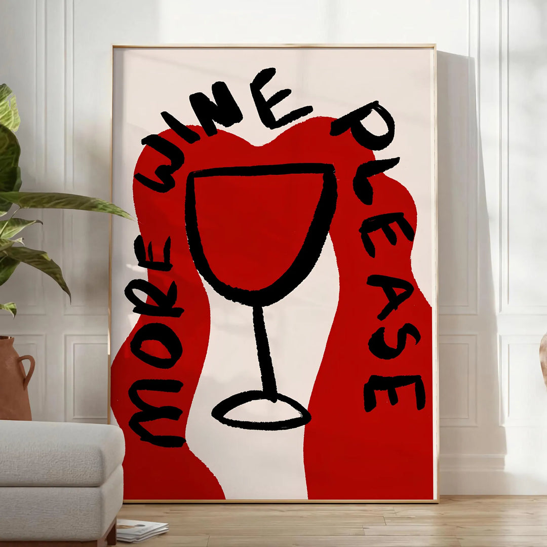 Una stampa da cucina minimalista con la frase 'More Wine Please' in lettere nere su sfondo grigio - in una stanza luminosa e minimalista con pianta e poltrona