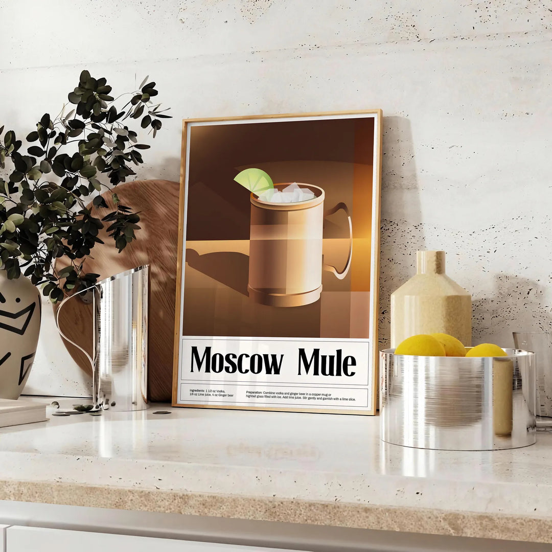 Moscow Mule cocktail in a copper mug with green garnishes on a black background - styled on a counter with eucalyptus and a bowl of lemons