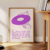 Abstract space scene in green and purple with motivational text - beside a round wooden side table with books