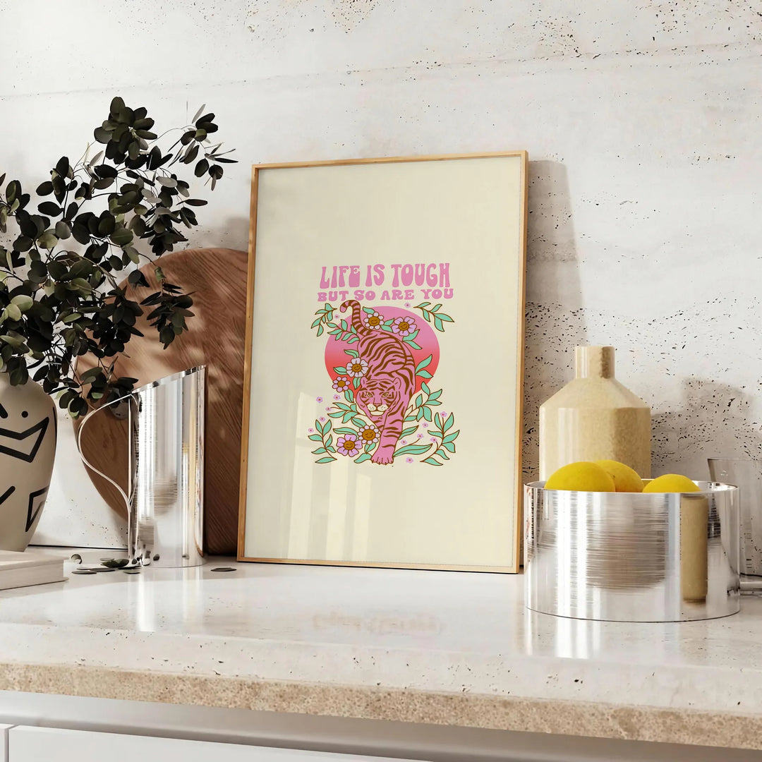 Abstract design featuring green and orange hues with motivational text - styled on a counter with eucalyptus and a bowl of lemons