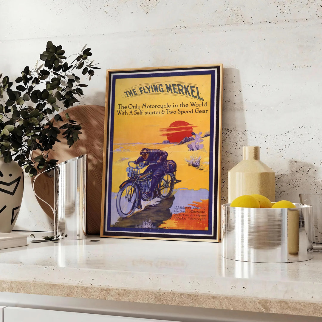 A dynamic illustration of a motorcycle on a road, with blue and yellow hues. - styled on a counter with eucalyptus and a bowl of lemons