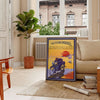 A dynamic illustration of a motorcycle on a road, with blue and yellow hues. - in a Parisian living room with a sofa and a fig plant