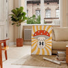 Retro-style poster featuring colorful mushrooms on a yellow background - in a Parisian living room with a sofa and a fig plant