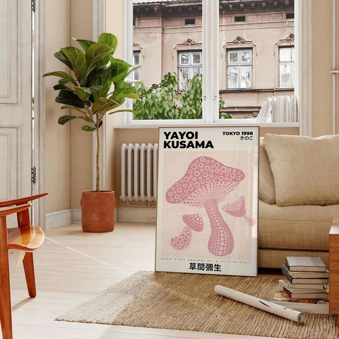 Colorful mushrooms in a whimsical style by Yayoi Kusama - in a Parisian living room with a sofa and a fig plant