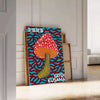 Colorful mushroom pattern with polka dots by Yayoi Kusama - leaning on a herringbone floor against a white panelled wall