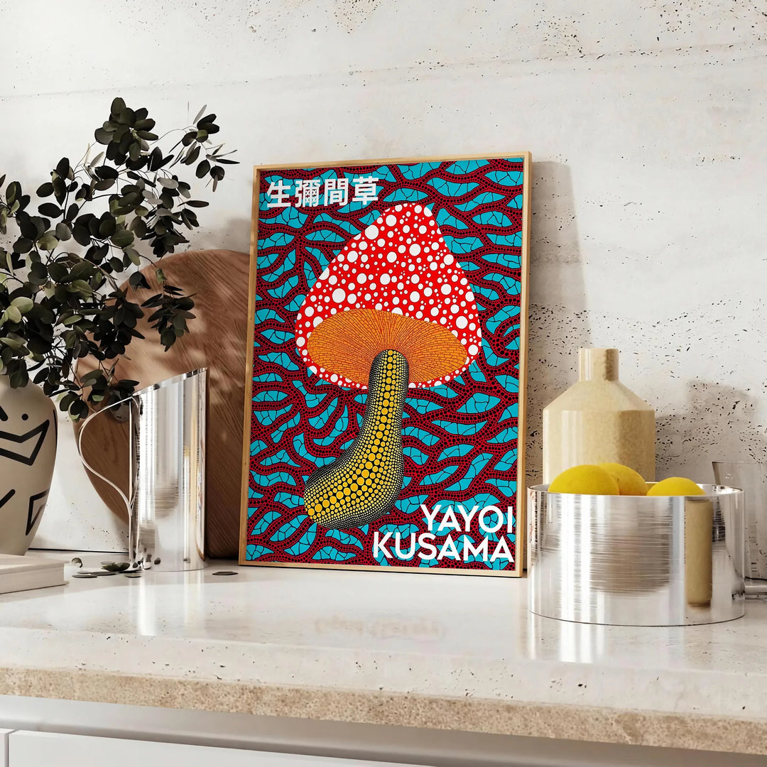 Colorful mushroom pattern with polka dots by Yayoi Kusama - styled on a counter with eucalyptus and a bowl of lemons
