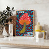 Colorful mushroom pattern with polka dots by Yayoi Kusama - styled on a counter with eucalyptus and a bowl of lemons