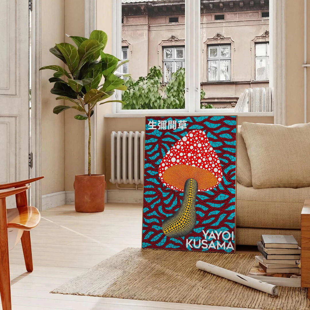 Colorful mushroom pattern with polka dots by Yayoi Kusama - in a Parisian living room with a sofa and a fig plant