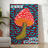 Colorful mushroom pattern with polka dots by Yayoi Kusama - in a bright minimalist room with a plant and an armchair