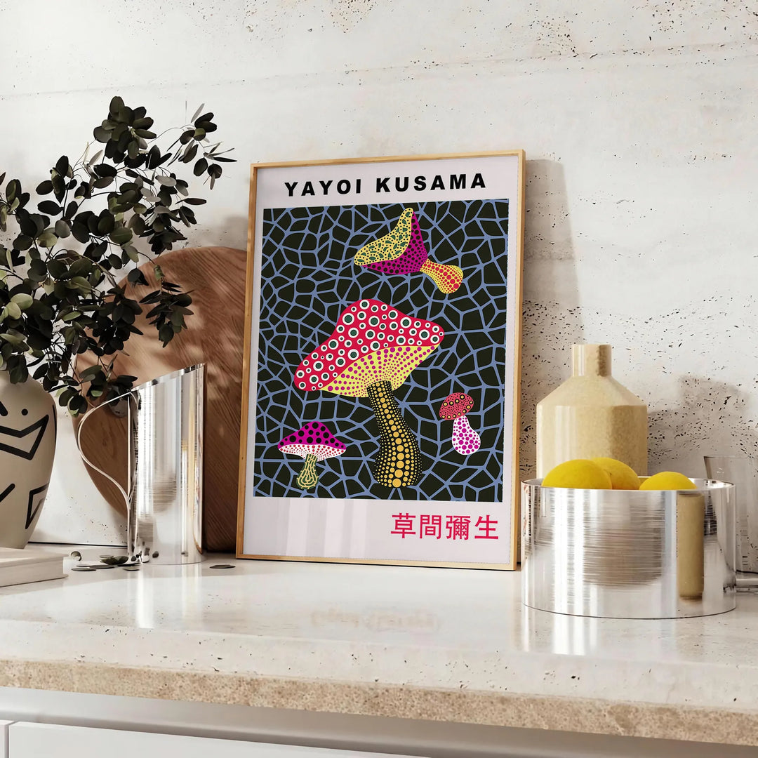 Colorful mushroom pattern with polka dots by Yayoi Kusama - styled on a counter with eucalyptus and a bowl of lemons