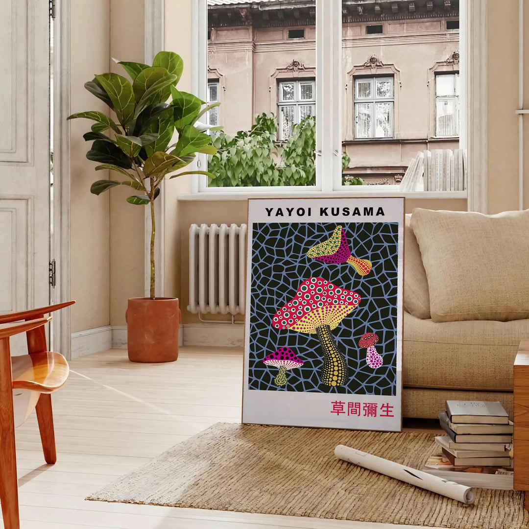 Colorful mushroom pattern with polka dots by Yayoi Kusama - in a Parisian living room with a sofa and a fig plant