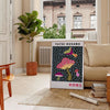 Colorful mushroom pattern with polka dots by Yayoi Kusama - in a Parisian living room with a sofa and a fig plant