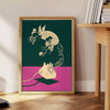Graphic art print featuring a stylized phone with green and red hues - beside a round wooden side table with books