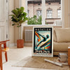 Red and white stylized butterfly stroke swimmer poster for 50 meters - in a Parisian living room with a sofa and a fig plant