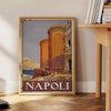 Illustration of Napoli with green and orange colors, featuring iconic landmarks - beside a round wooden side table with books