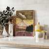 A serene landscape of a national park in gray and black tones - styled on a counter with eucalyptus and a bowl of lemons