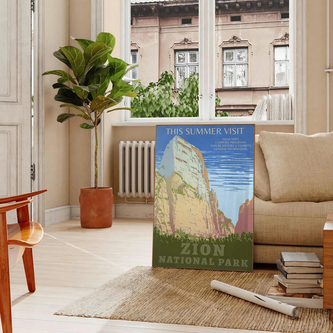 A serene landscape featuring lush green trees and earthy brown mountains in a national park. - in a Parisian living room with a sofa and a fig plant