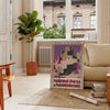 Illustration of national parks with green landscapes and earthy tones - in a Parisian living room with a sofa and a fig plant