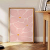 Escena abstracta de la naturaleza con tonos cálidos de naranja y amarillo - junto a una mesa auxiliar redonda de madera con libros