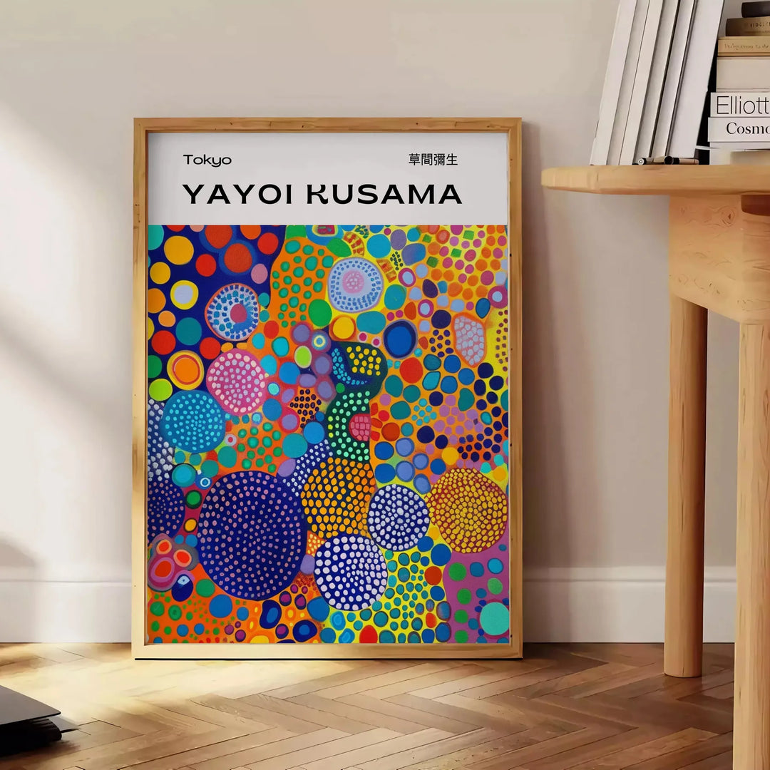 Abstract nature scene in Yayoi Kusama's iconic polka dot style with blue and earthy tones - beside a round wooden side table with books