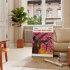 Abstract nature scene with polka dots in black and brown by Yayoi Kusama - in a Parisian living room with a sofa and a fig plant