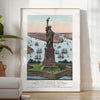 A travel poster featuring New York City with green and blue hues - in a bright minimalist room with a plant and an armchair