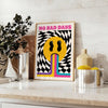 Abstract design featuring the phrase 'No Bad Days' in bold typography with black and orange tones - styled on a counter with eucalyptus and a bowl of lemons