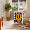 Abstract design featuring the phrase 'No Bad Days' in bold typography with black and orange tones - in a Parisian living room with a sofa and a fig plant